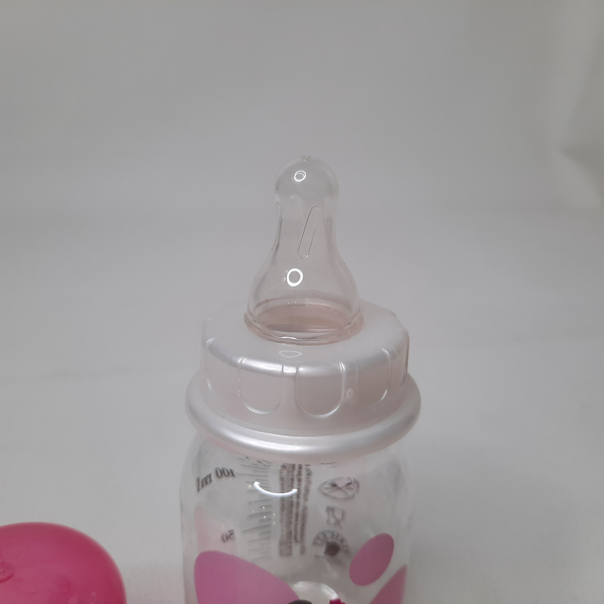 Petit biberon fushia 125ml - photo 7