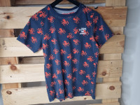 T-shirt bleu à motif - photo 7
